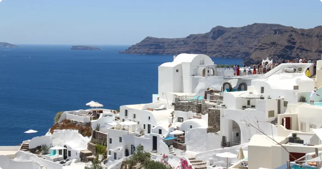 Iconic white and blue architecture of Santorini Greece, one of the best international vacation destinations for couples