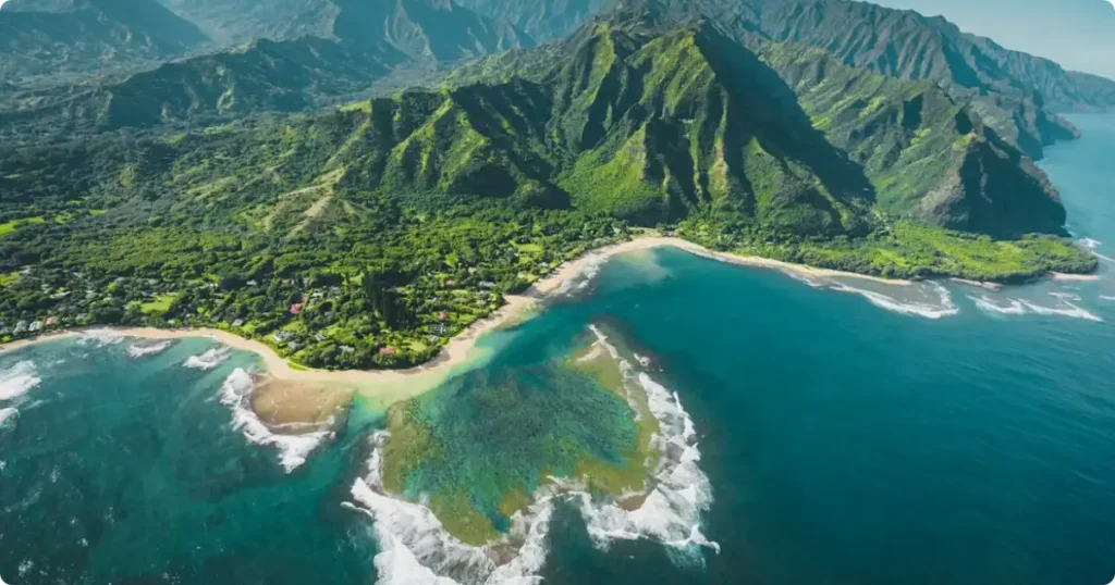 The Hawaiian Islands Explained: Names, Differences and What Each Island Is Known For Aerial view of the Hawaiian Islands rising from the Pacific Ocean, surrounded by deep blue water