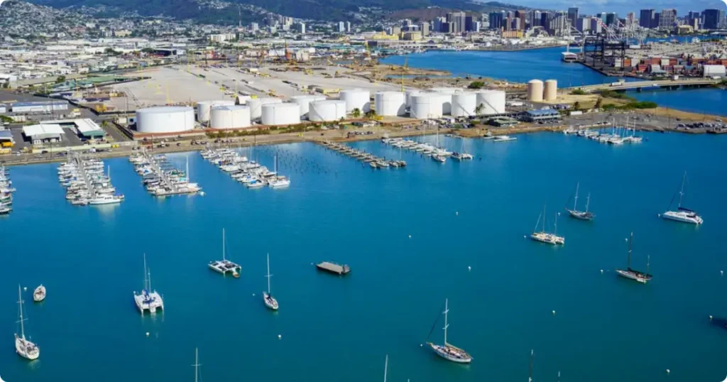 Pearl Harbor: Which Island It’s On, What to See and How to Plan Your Visit Aerial view of Pearl Harbor on Oahu Hawaii showing the harbor and memorial site