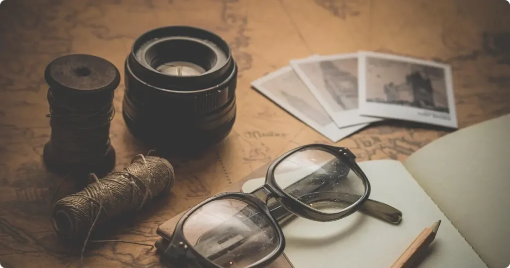 Open notebook and passport on a desk representing common travel planning mistakes to avoid
